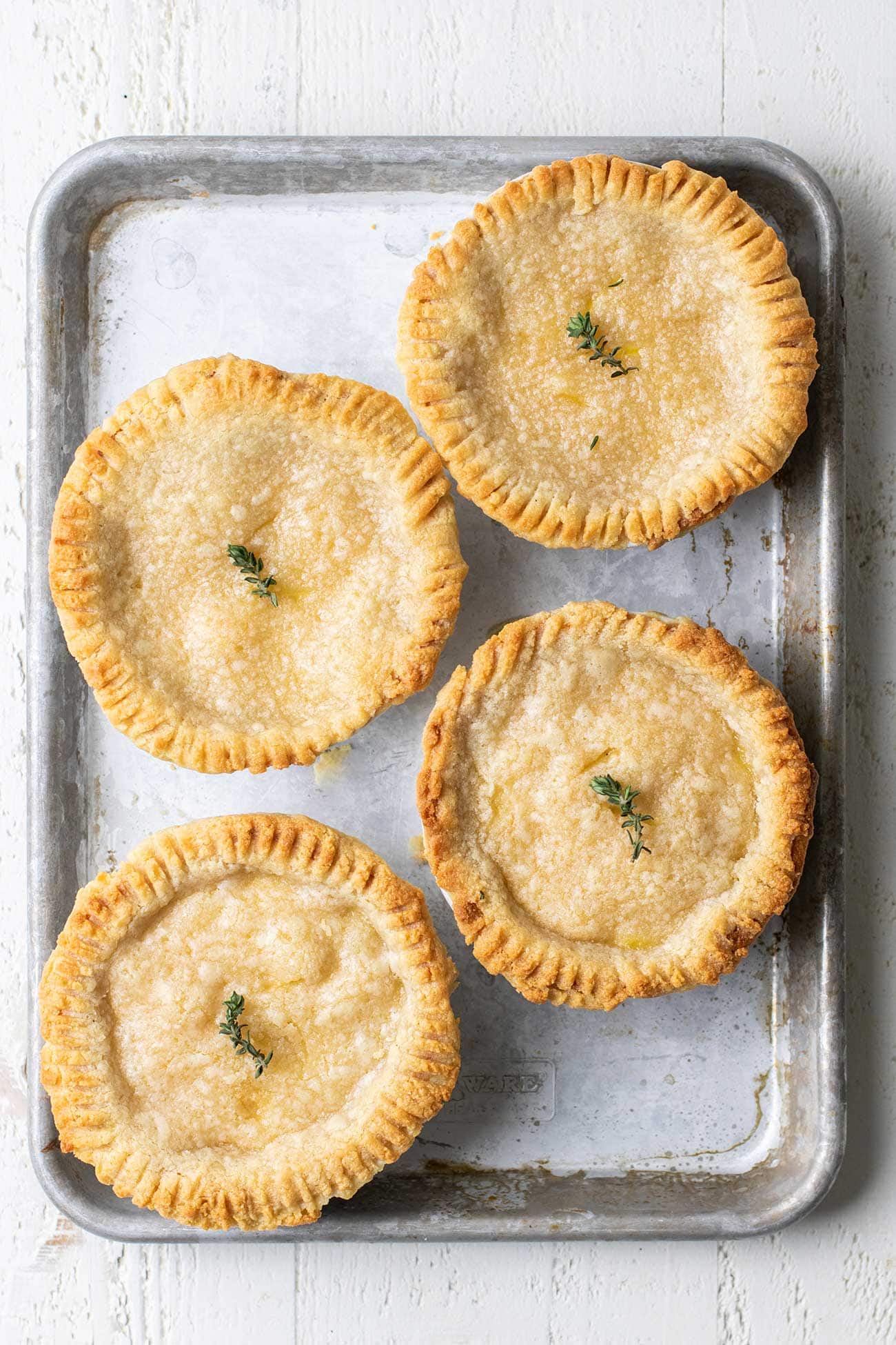 https://sunkissedkitchen.com/wp-content/uploads/2023/05/Chicken-pot-pies-8.jpg