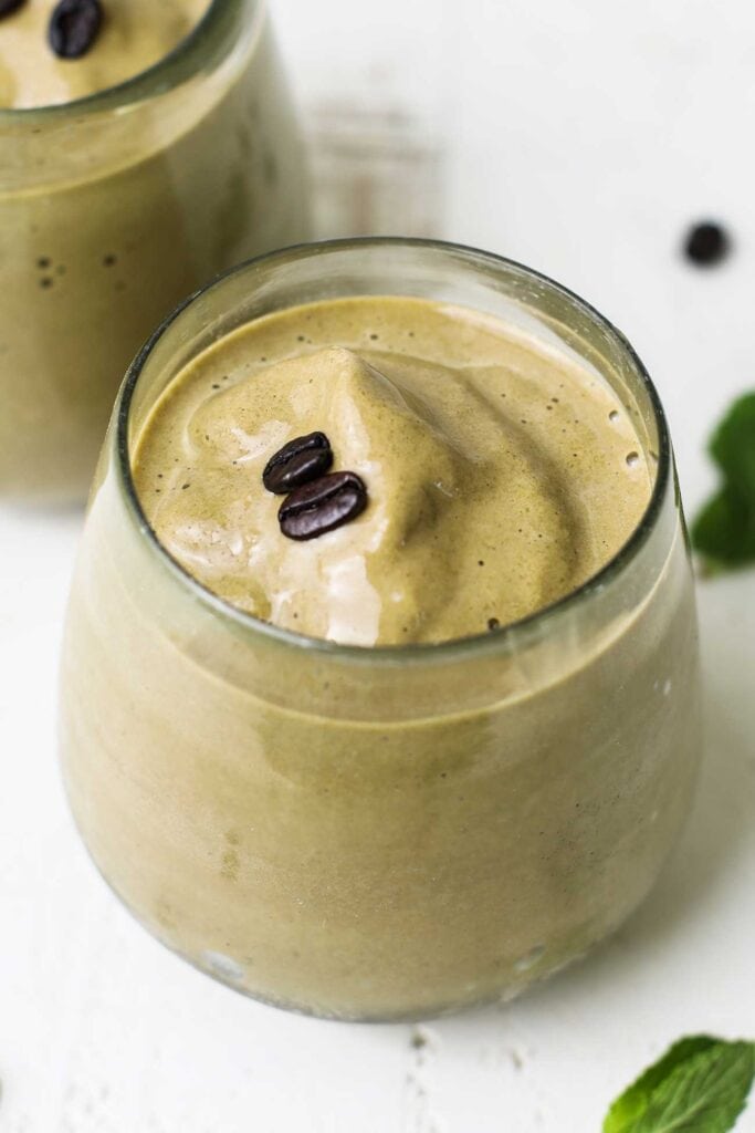 A thick creamy coffee smoothie shown in a glass.