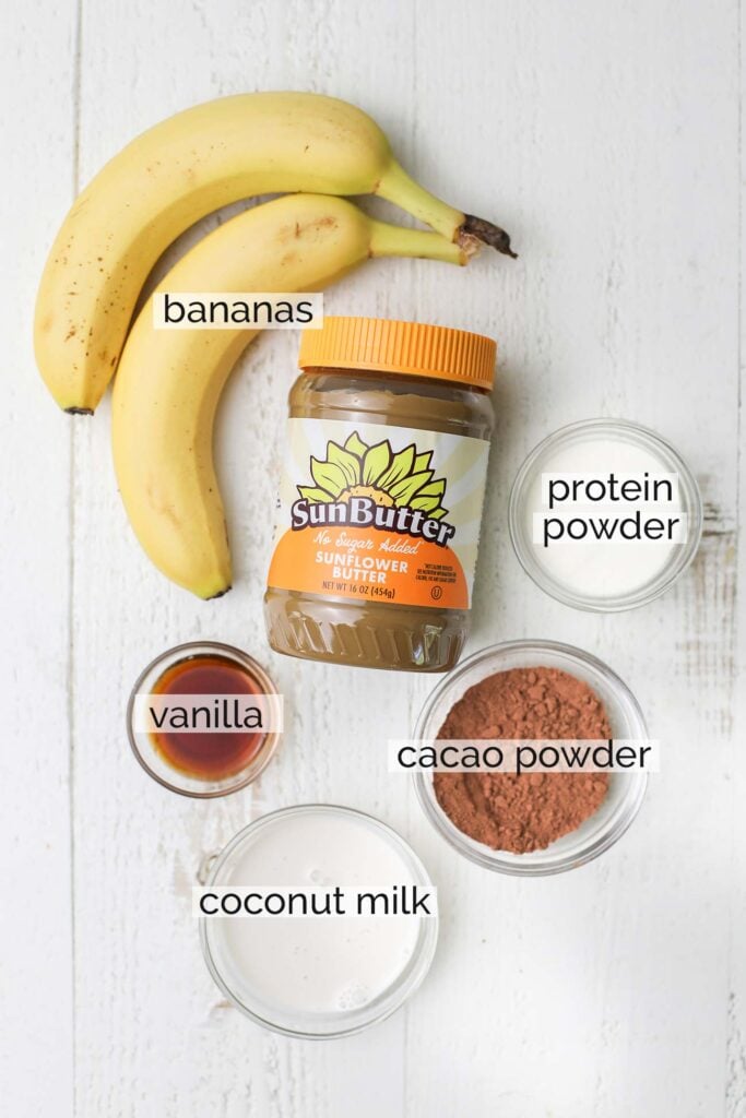 The ingredients needed to make thick chocolate smoothie bowls.
