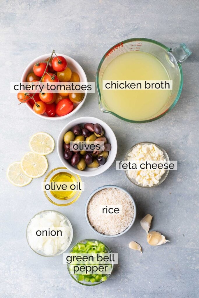 The ingredients needed to make a one pot Greek chicken and rice dish.