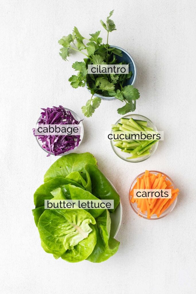 The ingredients needed to prepare lettuce wraps shown labeled.