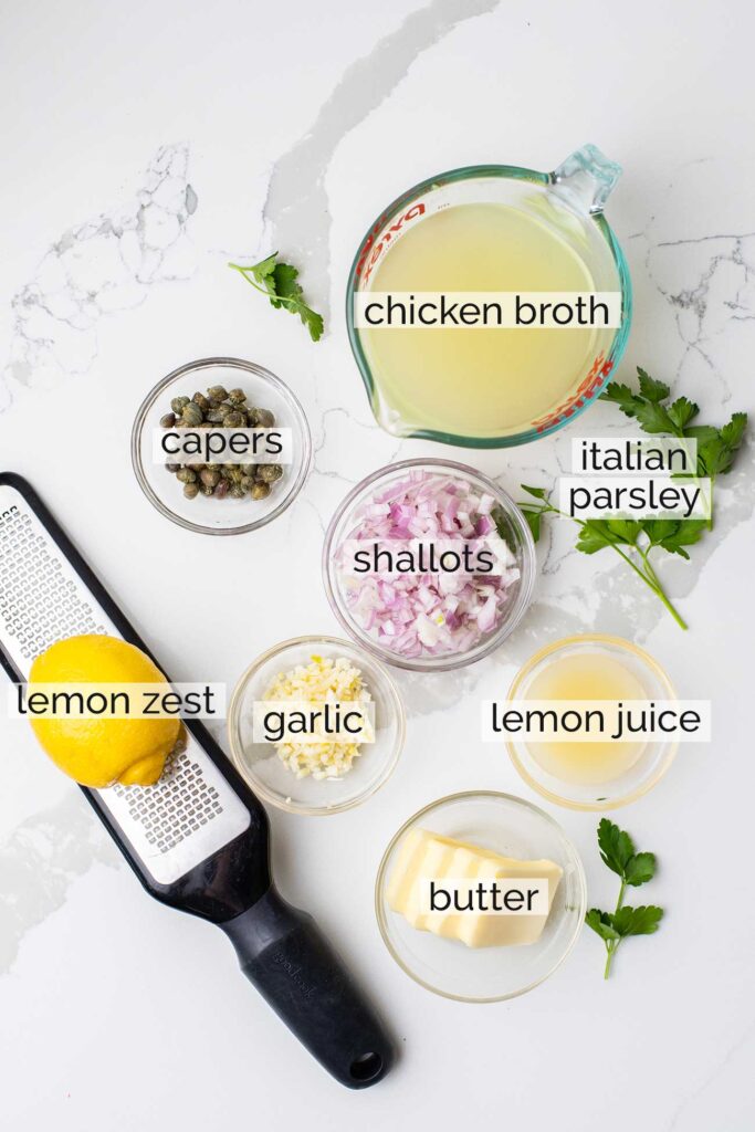 The ingredients needed to make a lemon butter caper sauce.