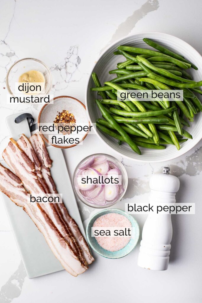 The ingredients needed to make bacon green beans.