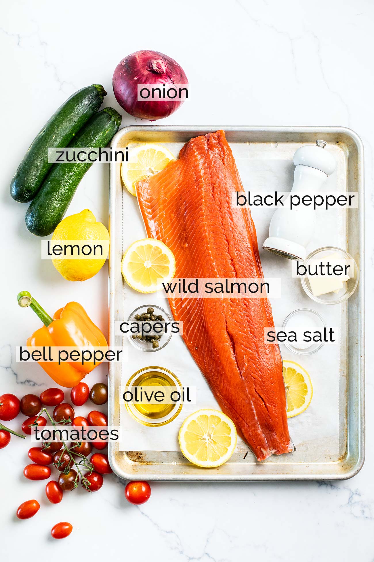 The ingredients needed to make baked mediterranean salmon.