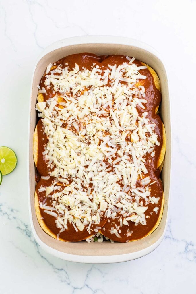 Step 5 shows layering the tortillas with vegetables, cheese, and enchilada sauce.