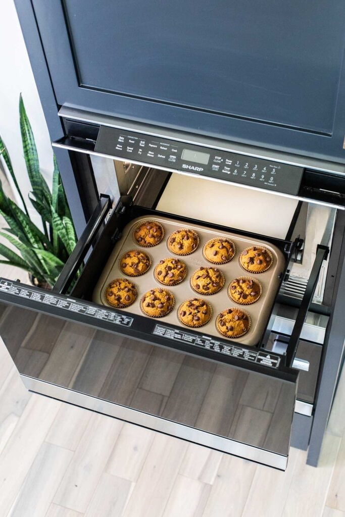 Muffins being baked in an oven.