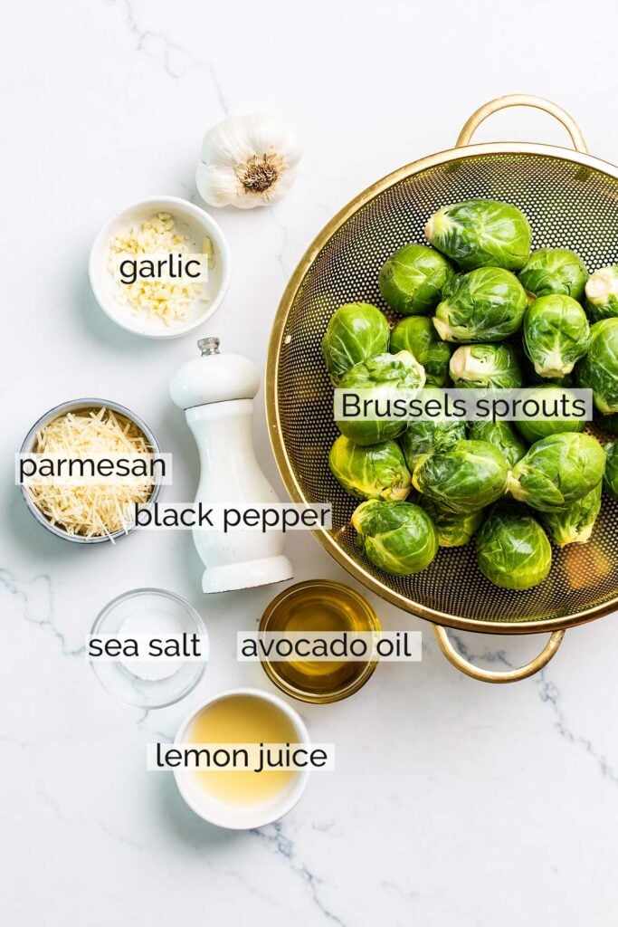 The ingredients needed to make parmesan crusted brussels sprouts.