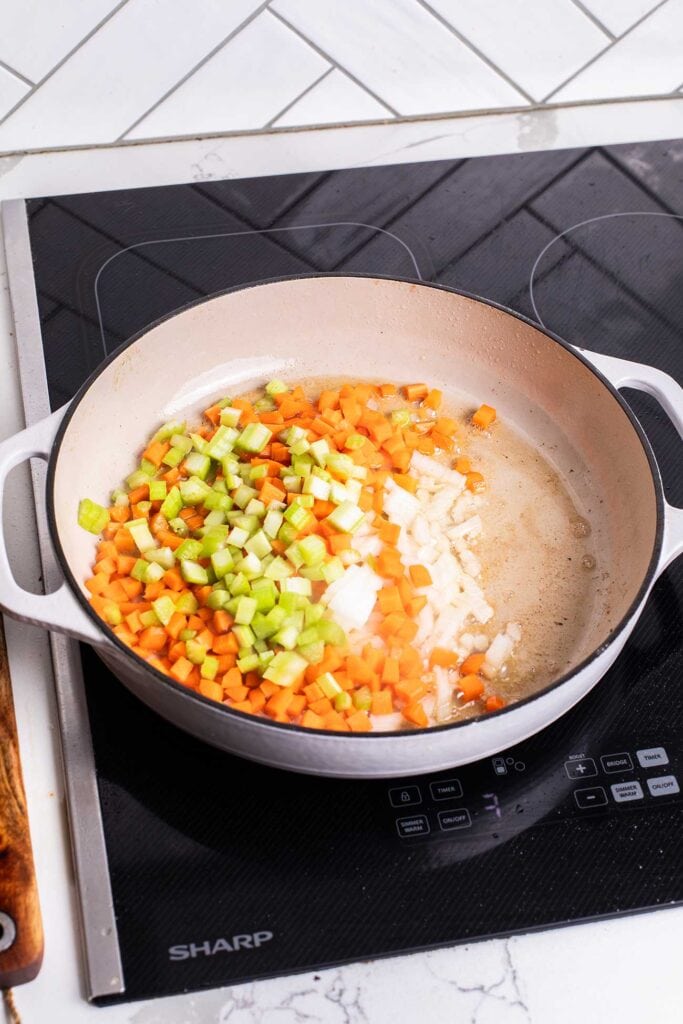 Step 2 shows sauteing together onions, carrots, and celery, a mixture referred to as sofritto.