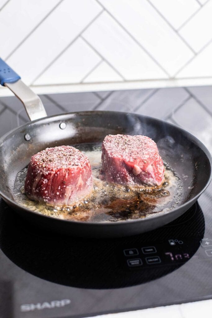 Step 2 shows searing the steaks in a skillet with butter and avocado oil.