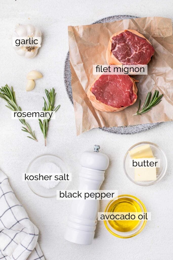 The ingredients needed to cook filet mignon steaks at home.