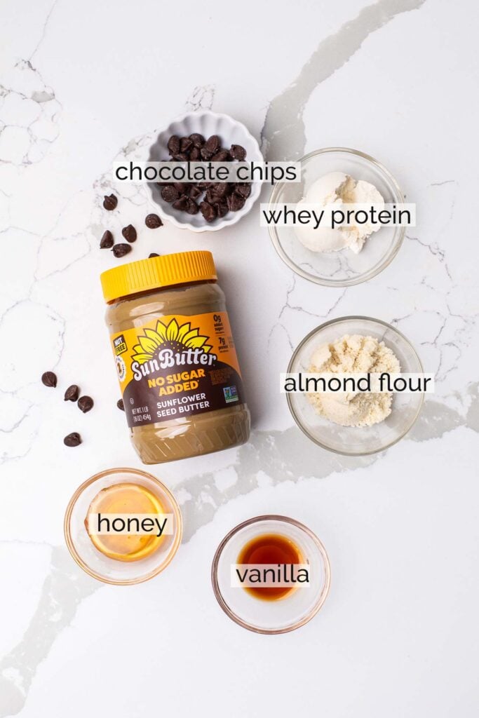 The ingredients needed to make protein cookies shown with labels.