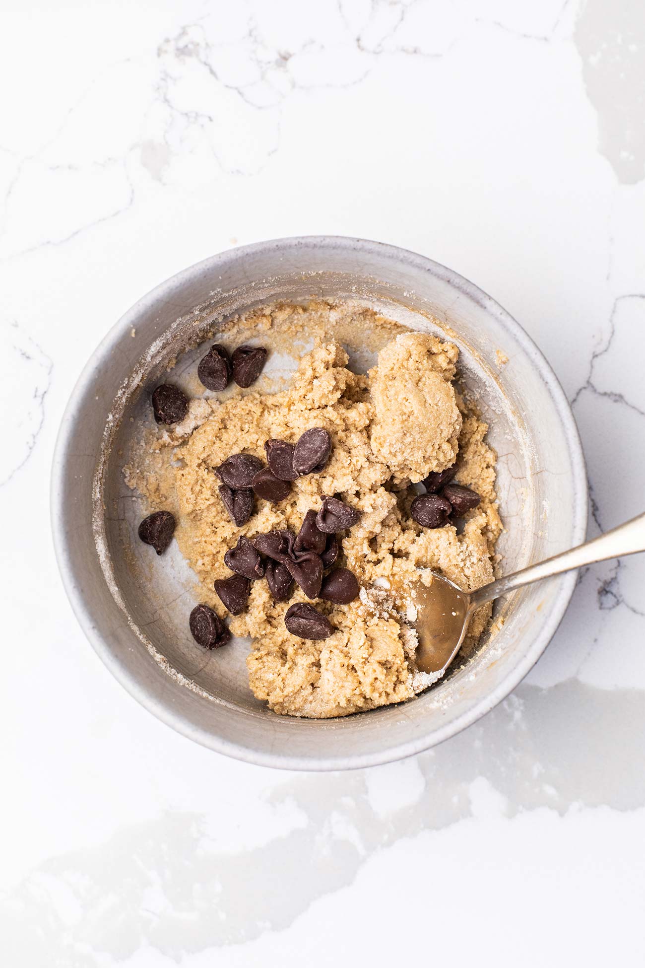 Chocolate chips added to the cookie dough.