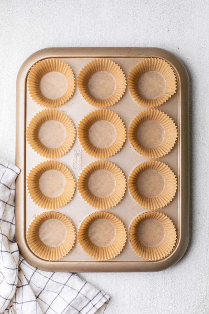 A muffin pan shown with liners.