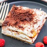 A healthy tiramisu recipe made with Greek yogurt shown on a black plate.