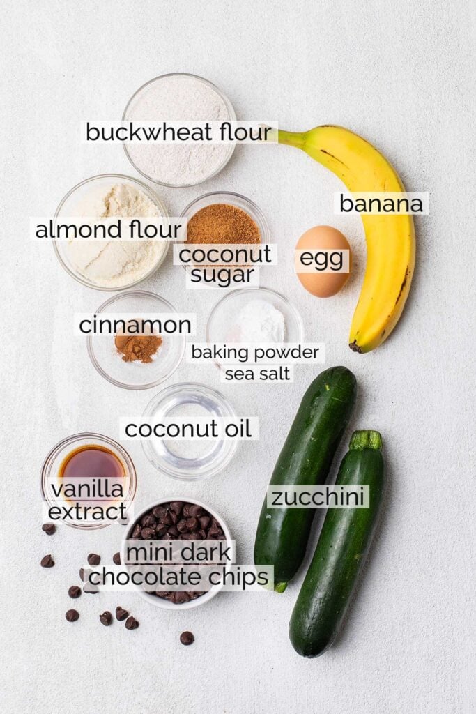 The ingredients needed to make wholesome buckwheat zucchini muffins.