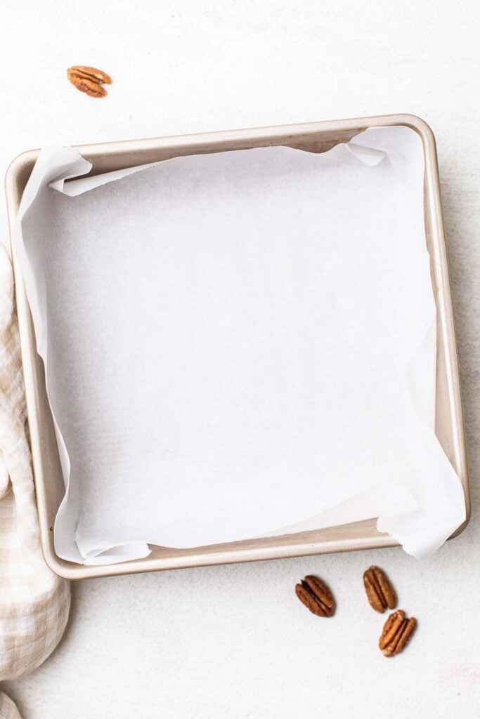 Step 1 shows lining a baking pan with parchment paper.