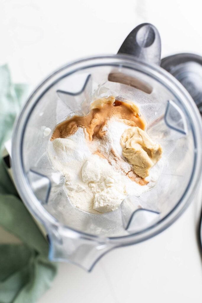 The ingredients for protein ice cream in a blender.