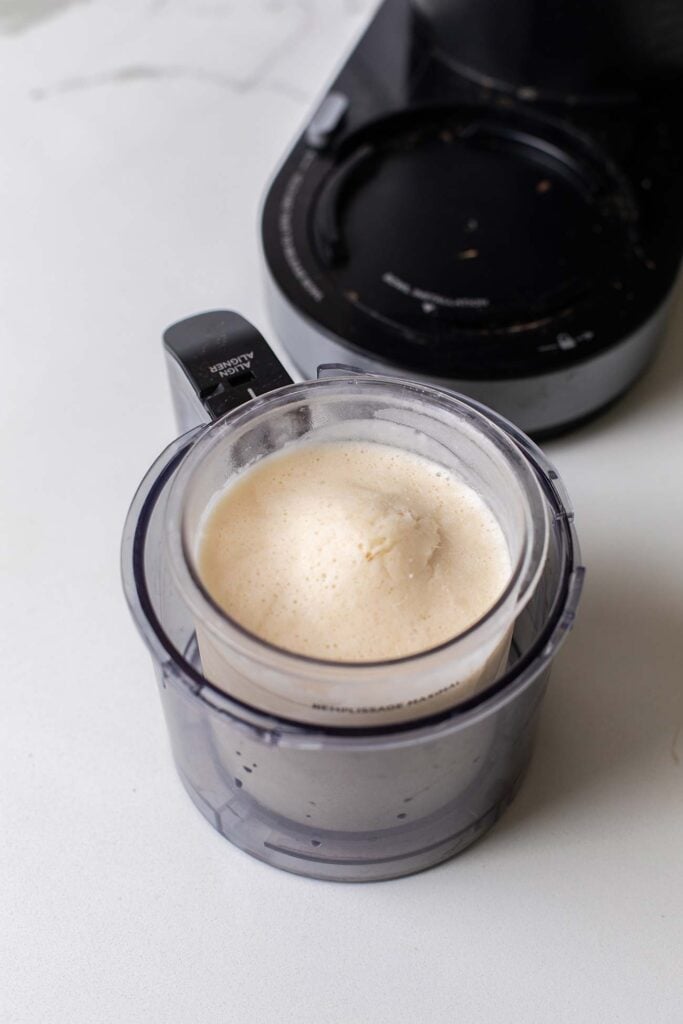 A frozen pint ready to be blended in the Creami.
