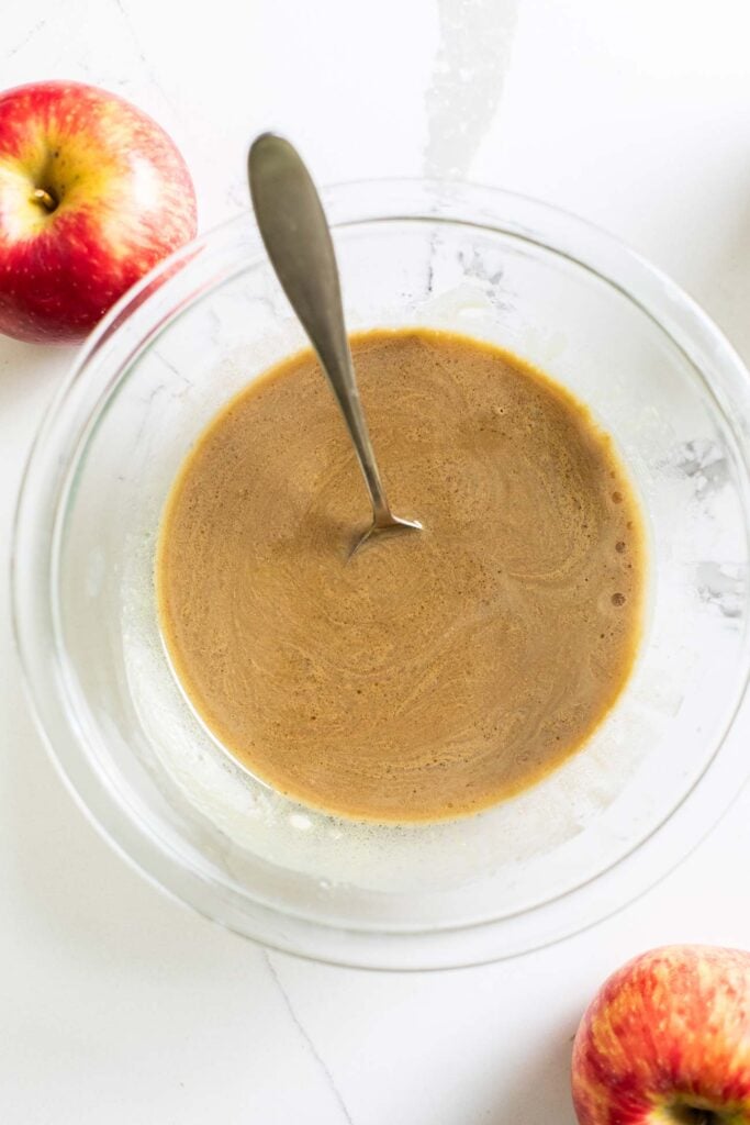 The wet ingredients whisked together in a bowl.
