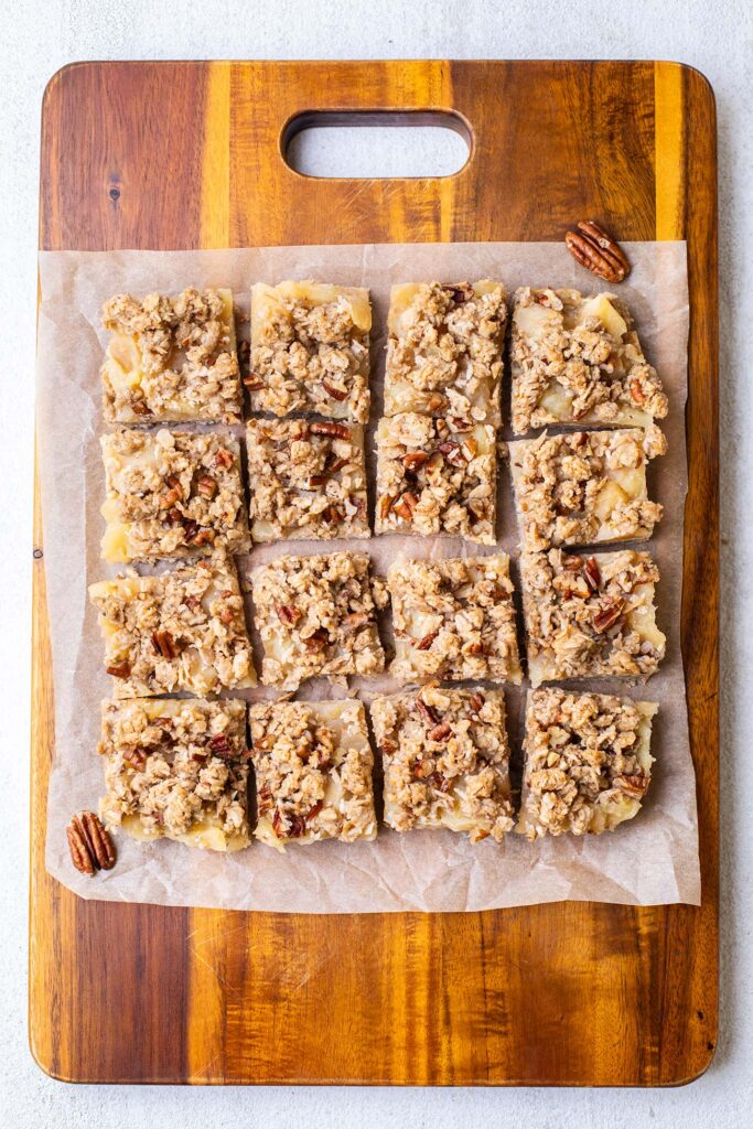 Baked apple crisp cookies shown cut into 16 squares.