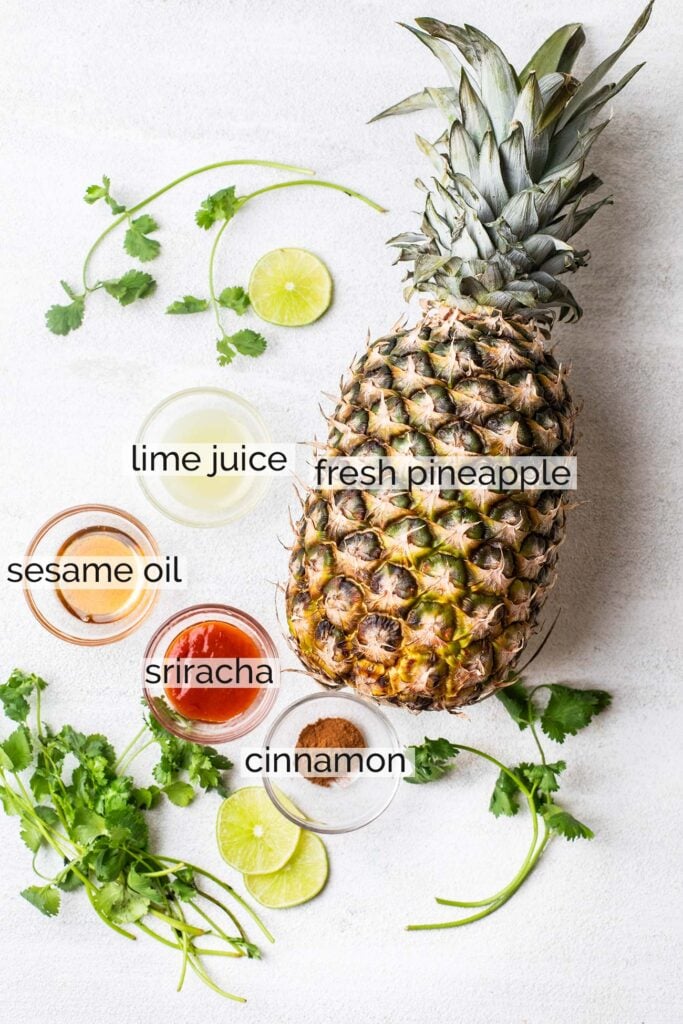 The ingredients needed for grilled pineapple shown with labels.