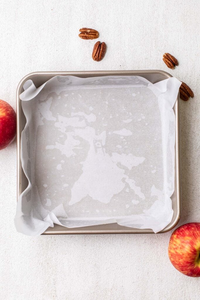 A baking pan lined with parchment paper.