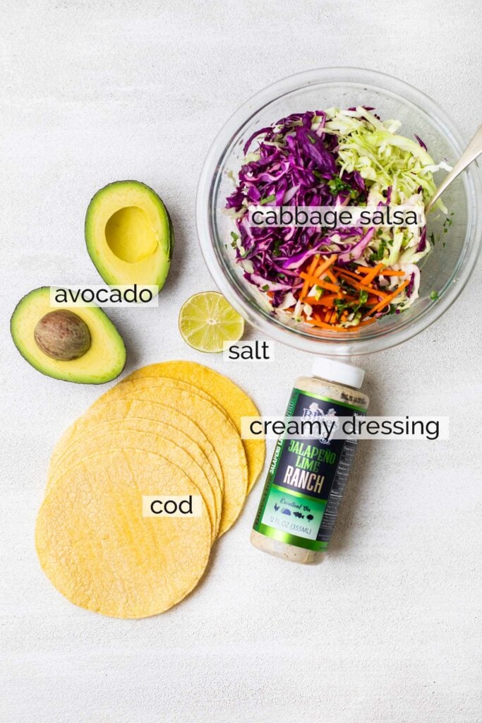 The ingredients needed to make fish tacos.