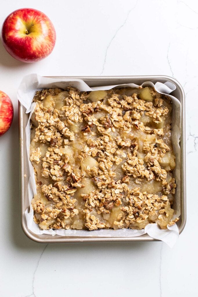 The bars shown with the oatmeal mixture sprinkled over the top of the applesauce.