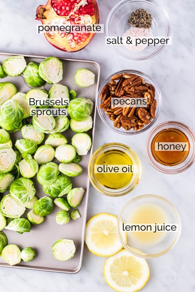 The ingredients needed to make brussels sprouts with pomegranate.