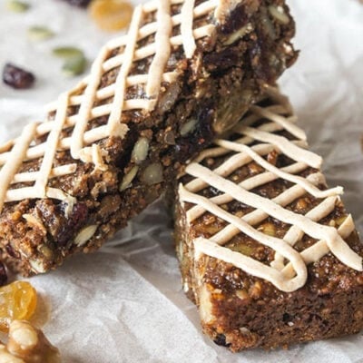 Two buckwheat bars shown drizzled with a creamy cheese icing.