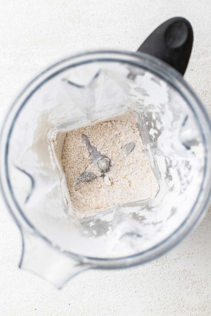 Oats ground into a flour in a blender.