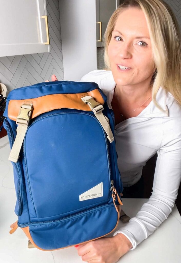 Michelle holding the getaway bag.