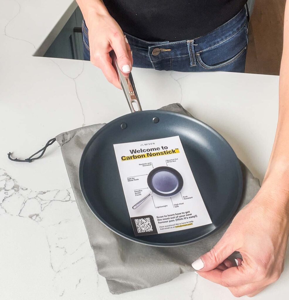 A carbon steel pan being unboxed.