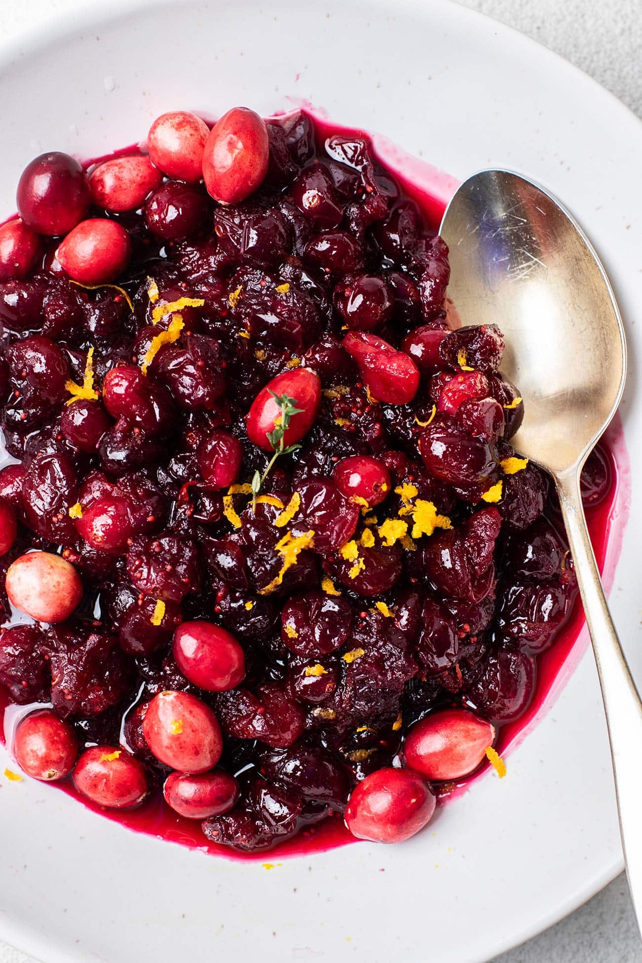 A close up look at fresh cranberry sauce made with maple syrup.