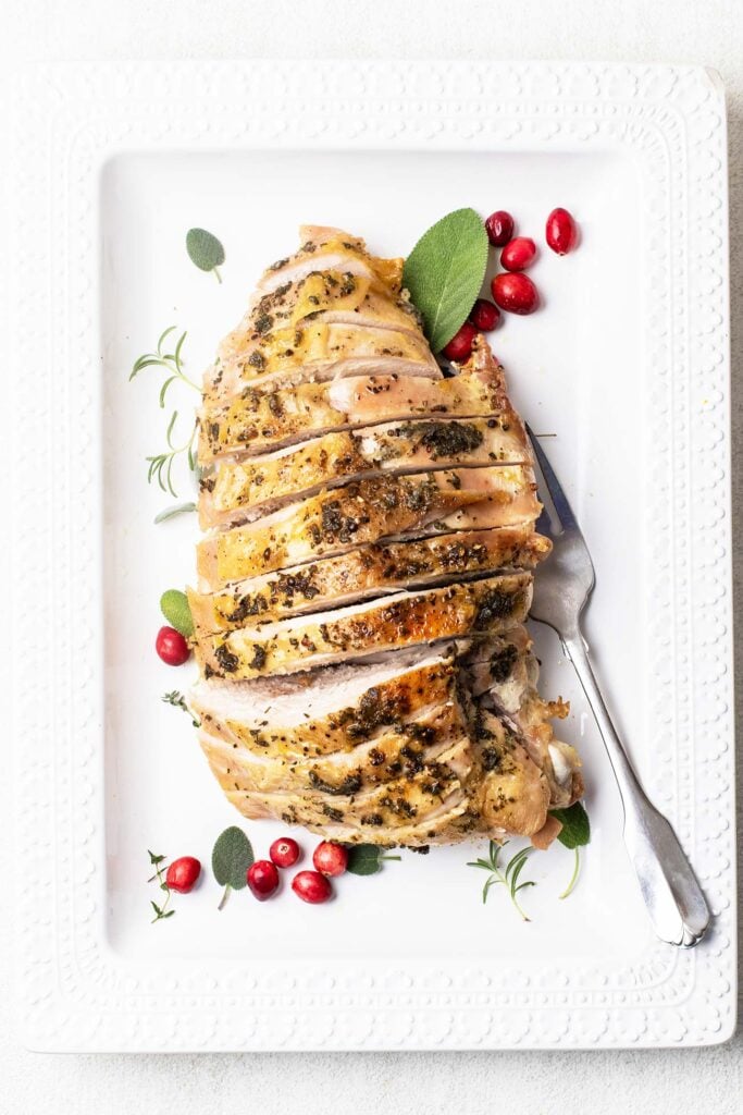 A turkey breast cut in thick slices.