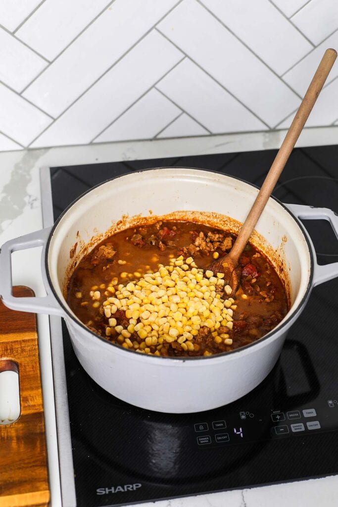 Add corn or beans to the chili.