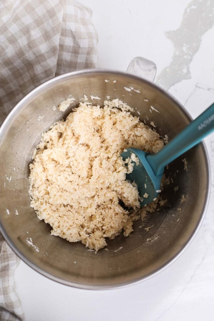 Allowing coconut batter to rest for 30 minutes.