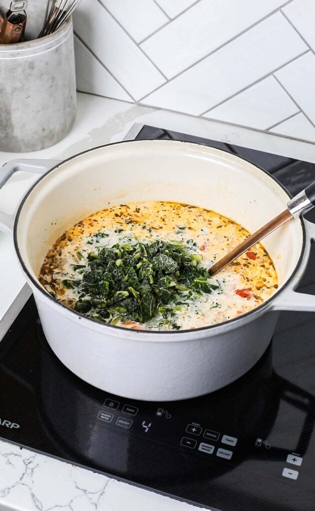 Kale added into the pot.