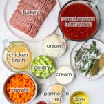 The ingredients needed to make a rich turkey bolognese.