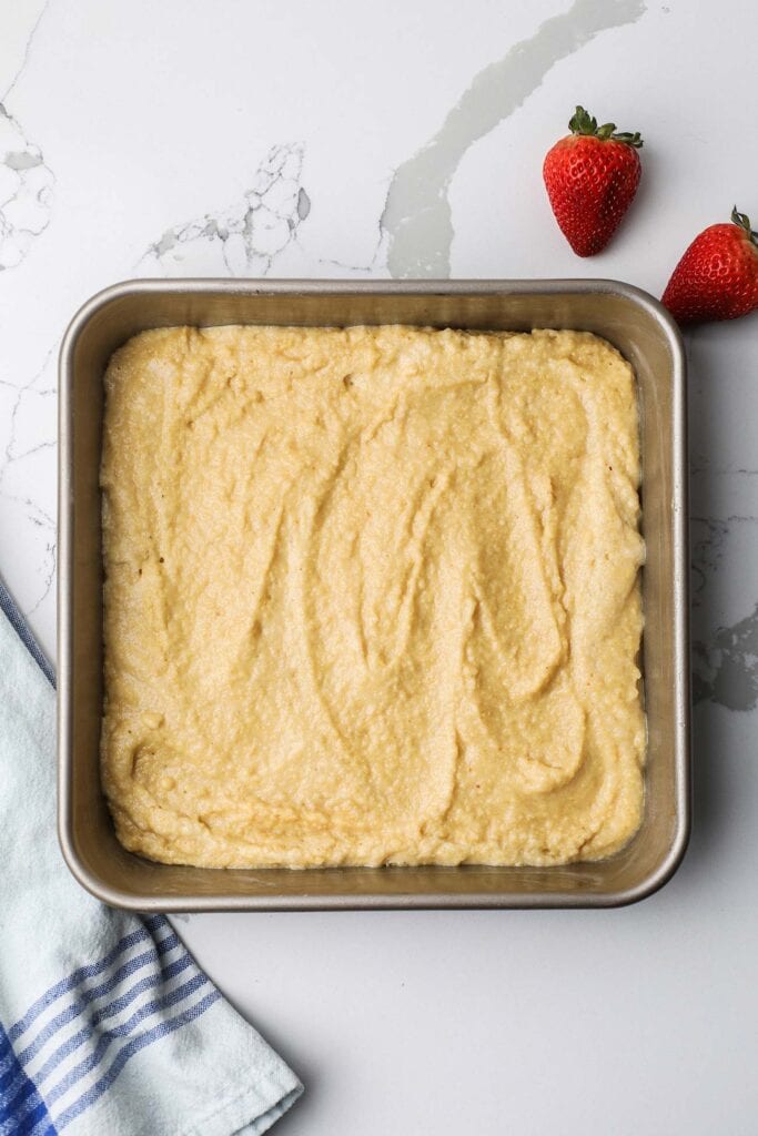The baking pan filled with the cake batter.