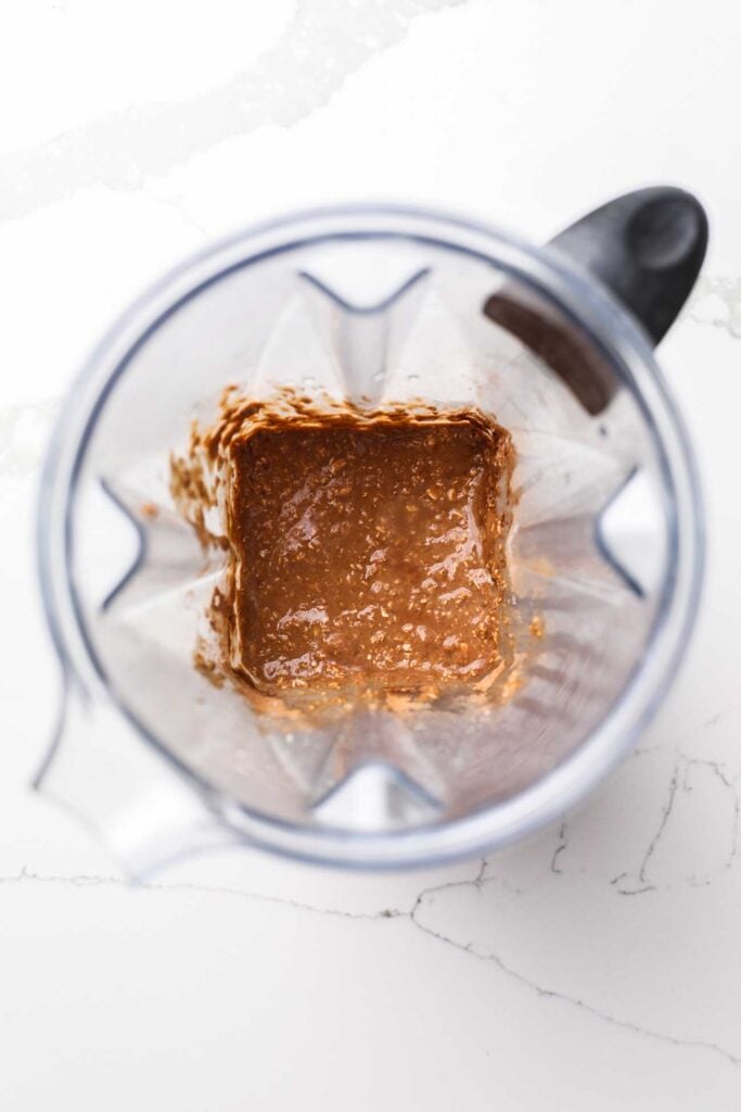 Oats, egg, milk, banana, and a few other ingredients blended in a blender.