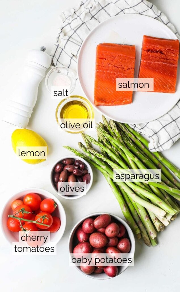 The ingredients needed for one-pan salmon and asparagus, shown with labels.