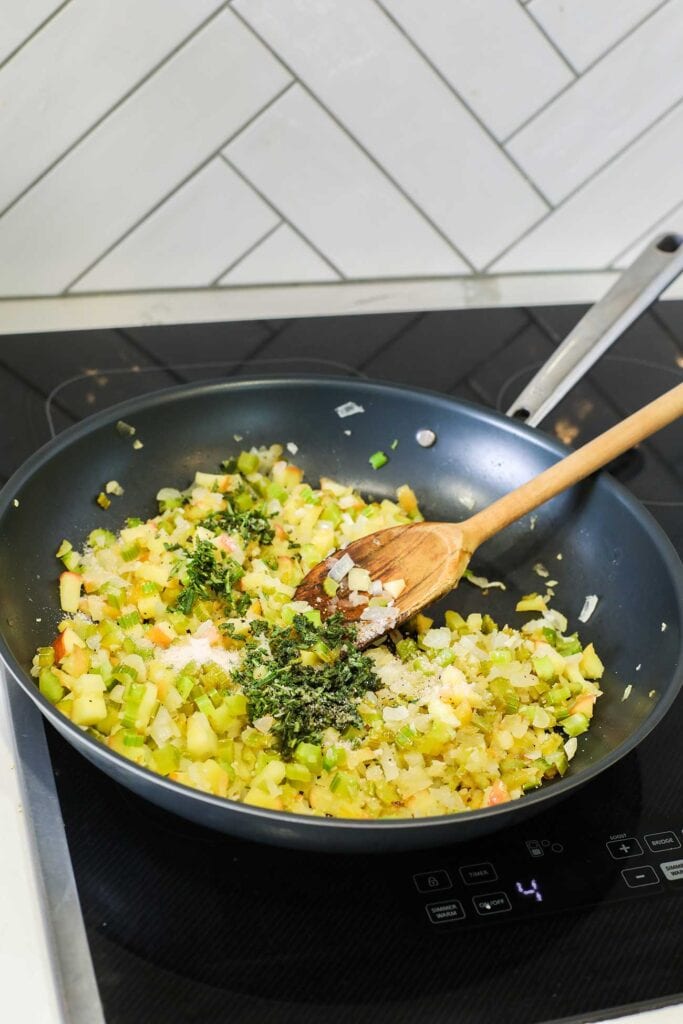 Fresh chopped sage and rosemary added to the sauteed vegetables.